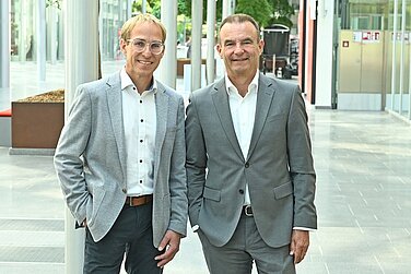 Markus Glaser-Gallion, CEO of the Leadec Group and Markus Marder, CEO of E.ON Energy Infrastructure Solutions.